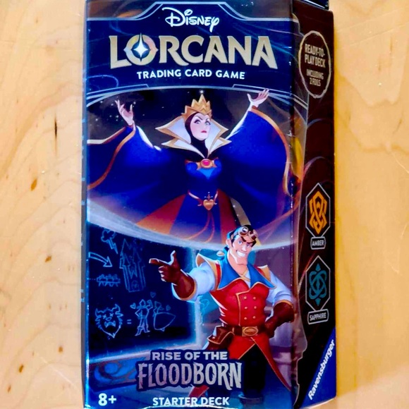 Disney Other - Disney Lorcana Rise of the Floodborn Starter Deck - Amber and Sapphire